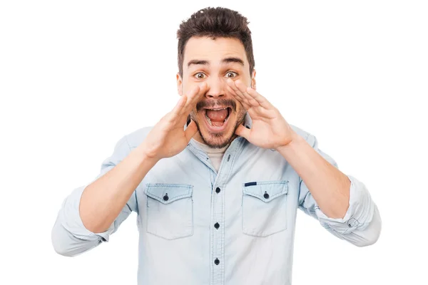 Cheerful young man shouting — Stock Photo, Image