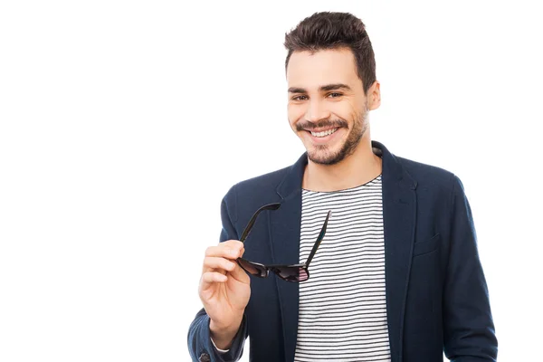 Hombre sosteniendo sus gafas en la mano —  Fotos de Stock