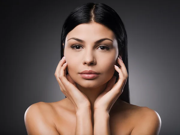 Shirtless woman touching face — Stock Photo, Image