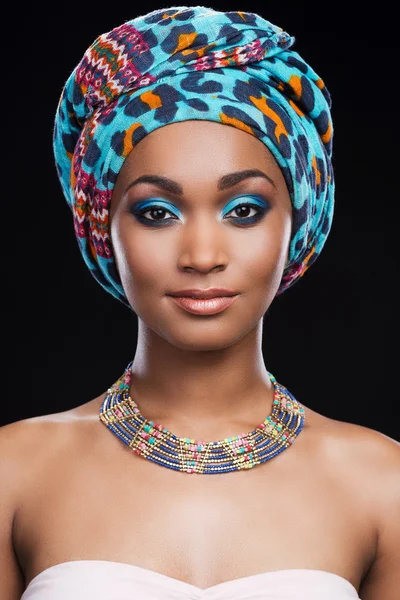 African woman wearing headscarf and necklace — Stock Photo, Image