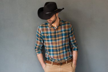 Young man wearing cowboy hat clipart