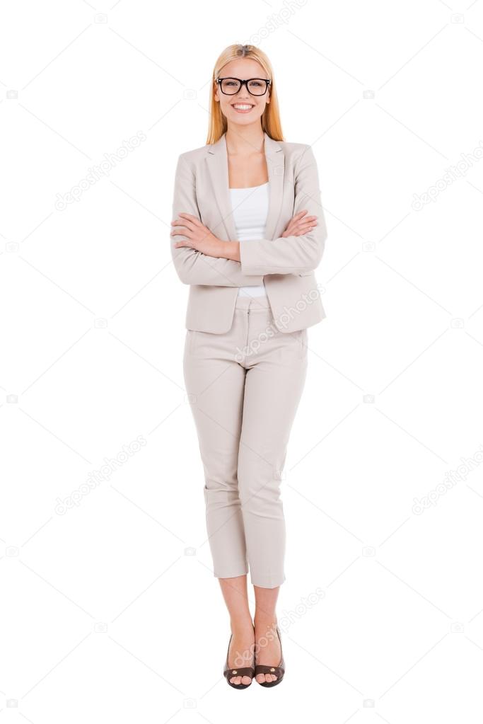 Woman in formalwear keeping arms crossed