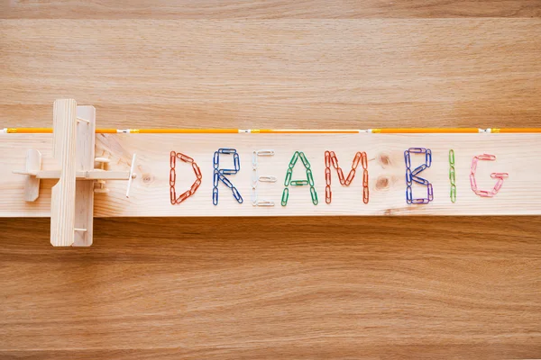 Dream big text made from colorful staples — Stock Photo, Image