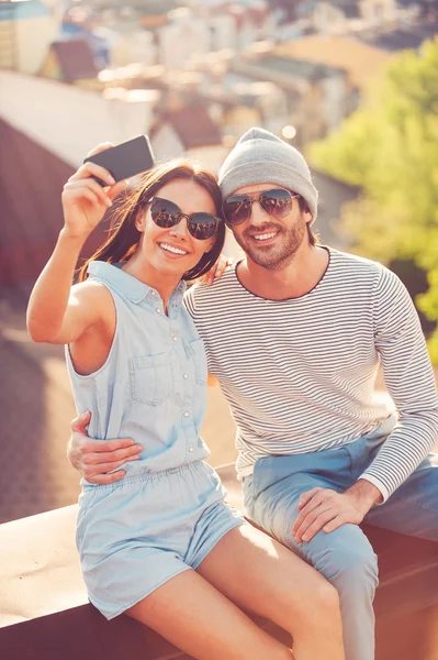 Couple making selfie by smart phone — Stock Photo, Image