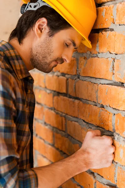 Depressed young building contractor in hardhat — Stock Photo, Image