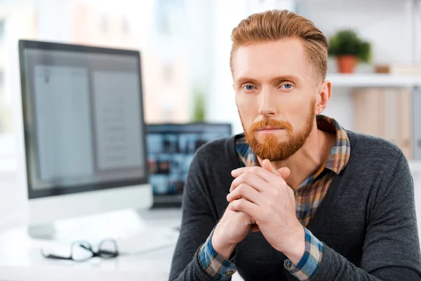 Thoughtful young bearded man — Stock Photo, Image