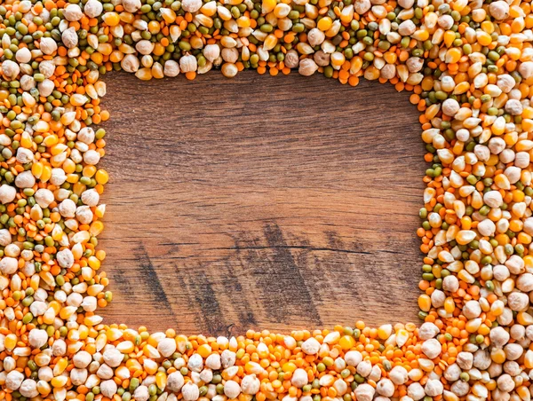 Groats moldura na mesa de madeira — Fotografia de Stock
