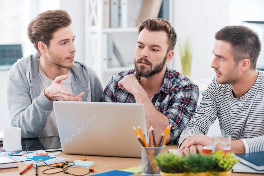 Men working together  in office