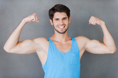 muscular man showing his perfect biceps