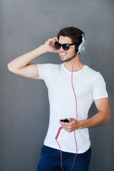 Joyful young man in headphones — Stock Photo, Image
