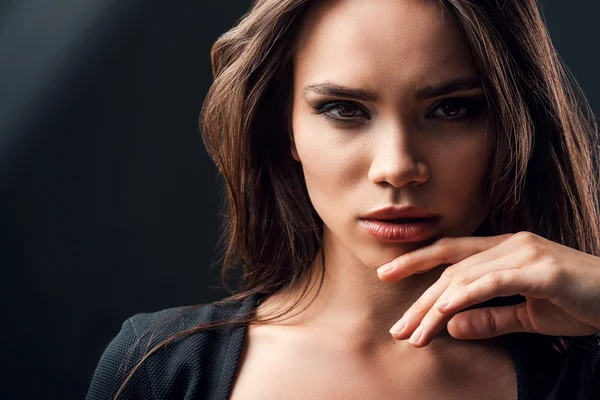 Beautiful  woman touching her chin — Stock Photo, Image