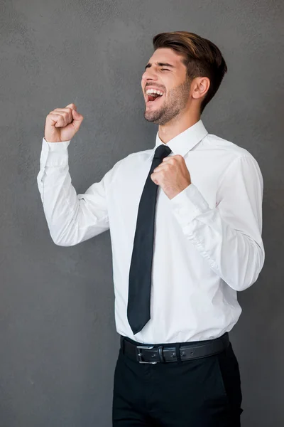 Handsome young excited man in shirt — Stock Photo, Image