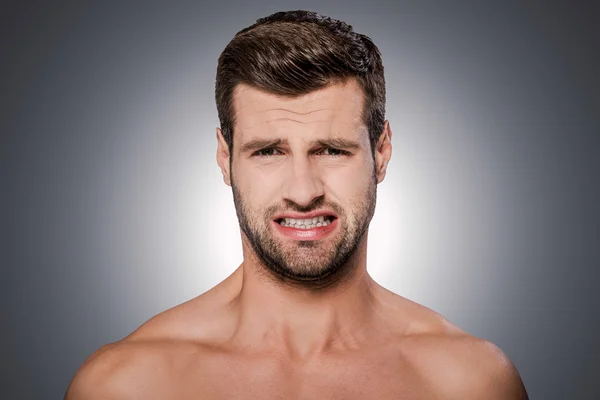 Frustrated young shirtless man — Stock Photo, Image