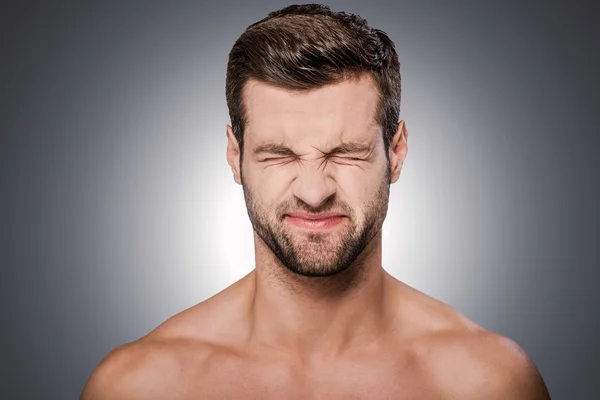 Frustrated young shirtless man — Stock Photo, Image