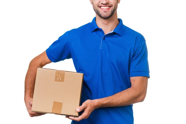 Courier holding cardboard box — Stok fotoğraf