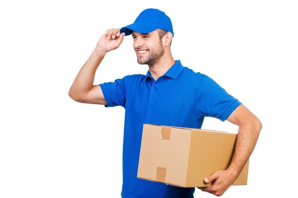 Courier hålla låda och justera cap — Stockfoto