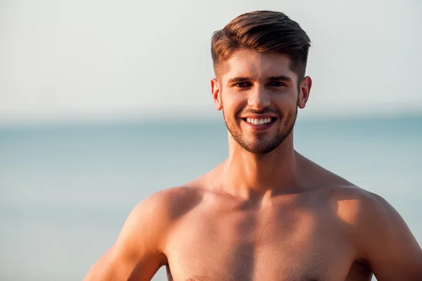 Happy young muscular man — Stock Photo, Image