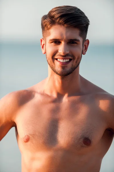 Cheerful young muscular man — Stock Photo, Image