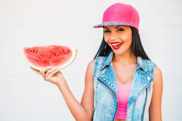 Woman holding slice of watermelon — Stock Photo, Image
