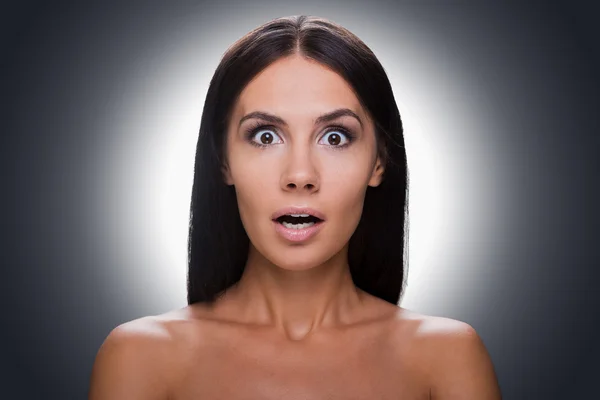 Surprised young shirtless woman — Stock Photo, Image