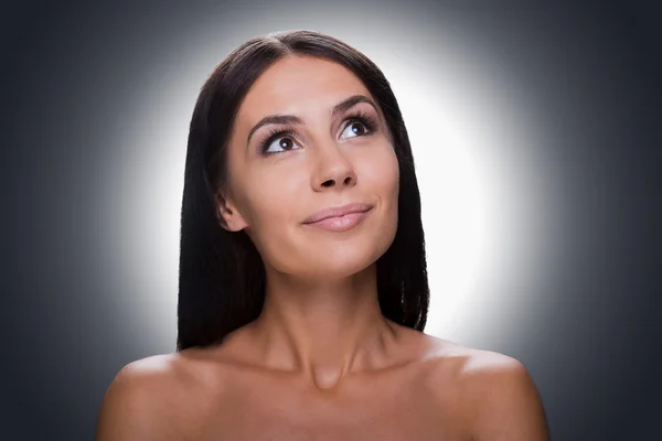 Young shirtless woman looking up — Stock Photo, Image