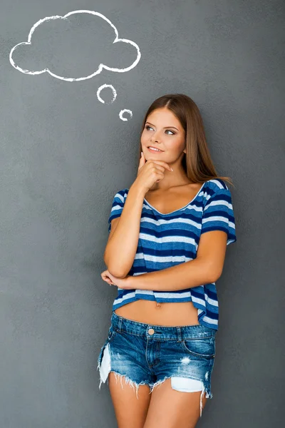 Thoughtful young woman with speech bubble — Stock Photo, Image