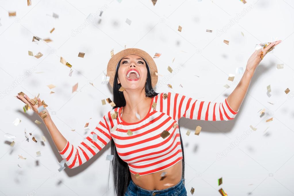 woman and confetti falling on her