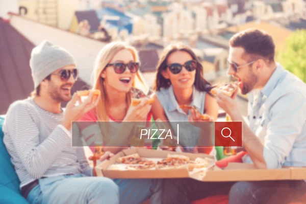 people eating pizza