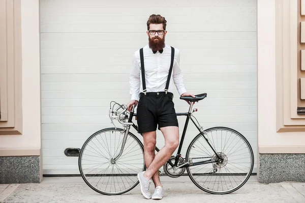 Handsome Hipster with bicycle — Stock Photo, Image