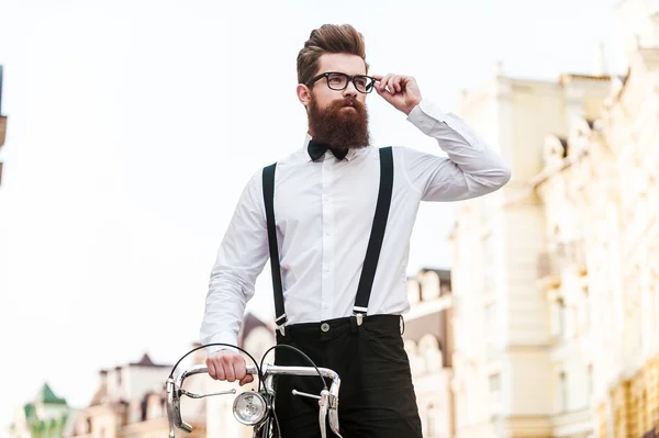 Handsome Hipster with bicycle — Stock Photo, Image