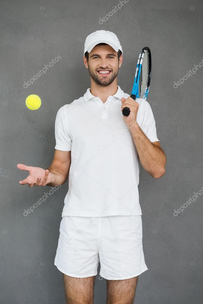 Handsome man in tennis clothes Stock Photo by ©gstockstudio 81668406