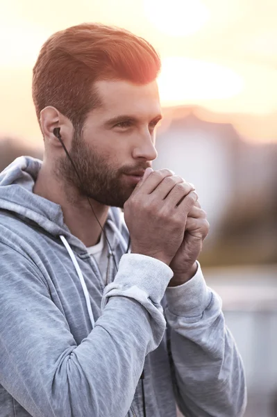 Man warming up his hands — Stock Photo, Image