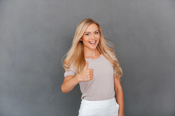 Woman showing her thumb up — Stock Photo, Image