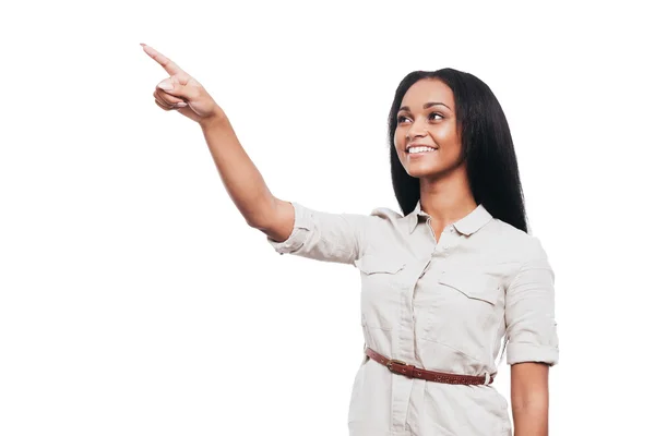 African woman pointing away — Stock Photo, Image