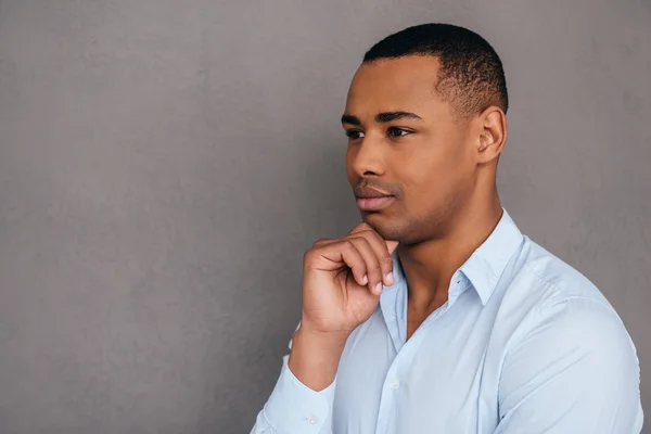 Thoughtful young African man — Stock Photo, Image