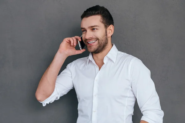 Young man talking on the mobile phone — Stock Photo, Image