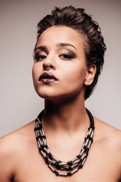 Woman with nose ring and necklace — Stock Photo, Image