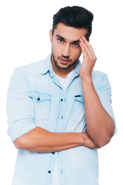 Thoughtful young Indian man — Stock Photo, Image