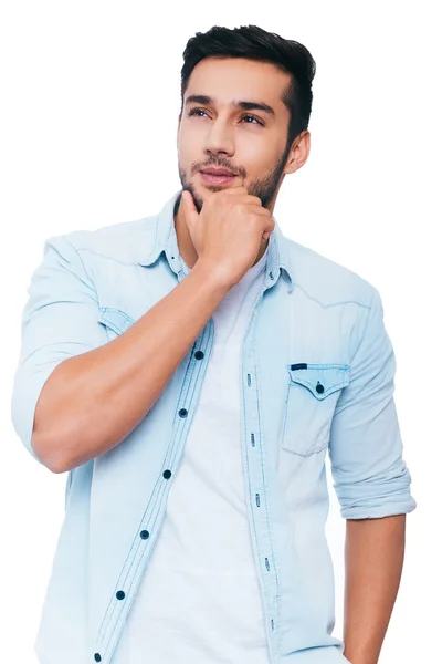 Thoughtful young Indian man — Stock Photo, Image