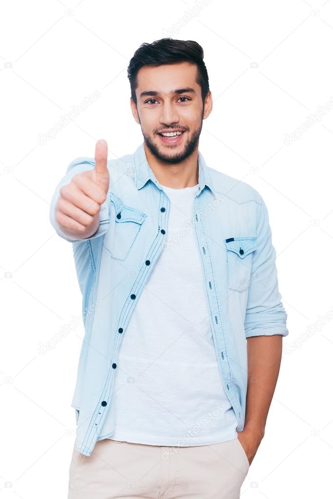 Indian man showing his thumb up