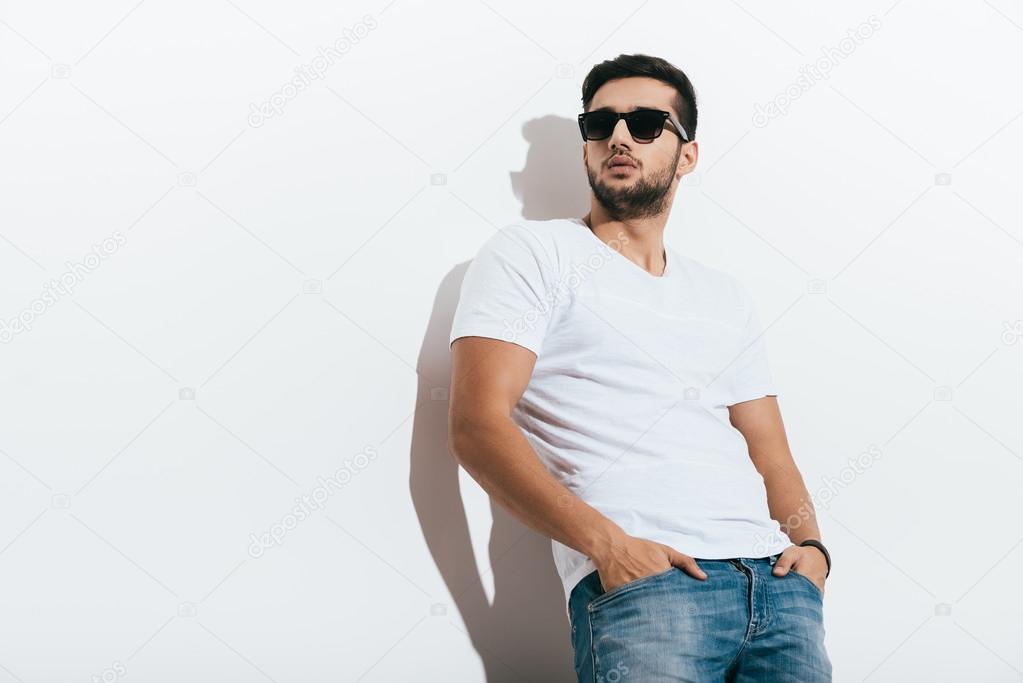 handsome young Indian man in sunglasses