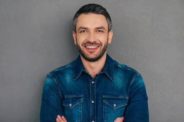 Confident mature man in jeans shirt — Stock Photo, Image