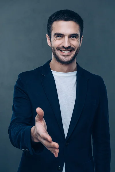 Man reaching out hand for greeting — Stock Photo, Image