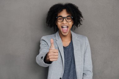 African man showing his thumb up