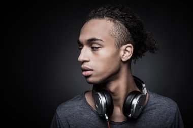 African man wearing headphones