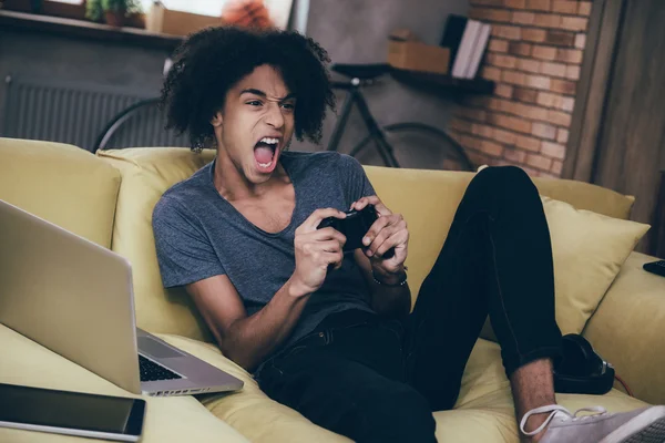 African man playing video game — Stok fotoğraf