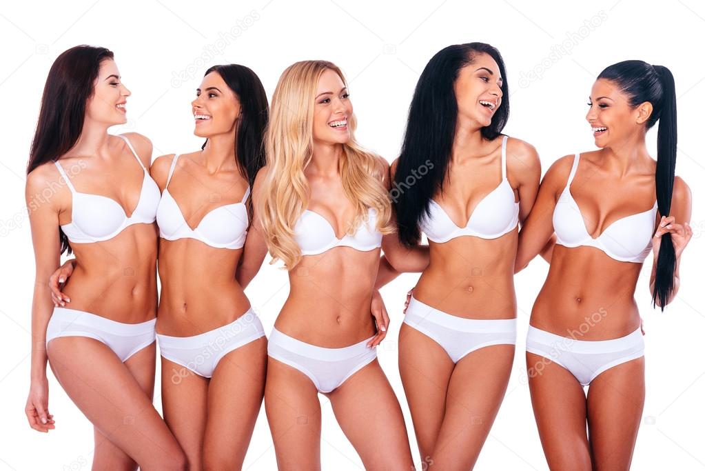 Women in lingerie embracing