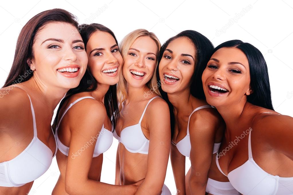 Women in white lingerie making selfie