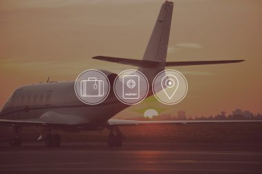 private jet landing in sunset