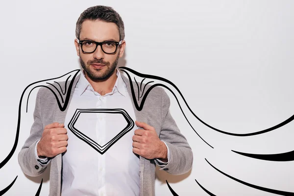 Confident man looking like superhero — Stockfoto